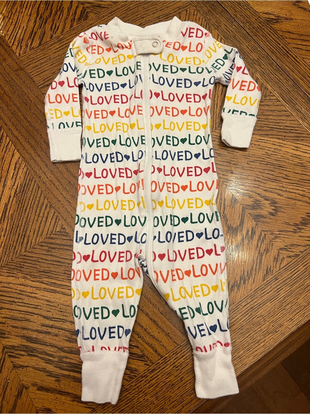 Hanna Andersson White Footie Pajamas with Multicolor "LOVED" Print